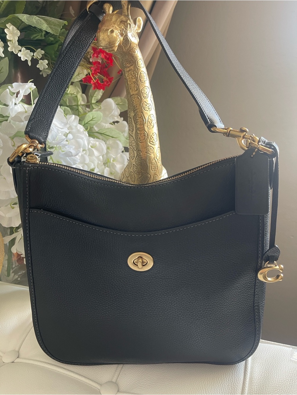 COACH Polished Pebble Leather Chaise Crossbody in black